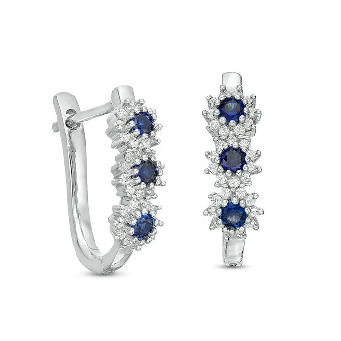 Goldia Earrings LabCreated Blue Sapphire and 02 CT TW Diamond Three Stone Sunburst Hoop Earrings in 10K White Gold Goldia Earrings LabCreated Blue Sapphire and 02 CT TW Diamond Three Stone Sunburst Hoop Earrings in 10K White Gold