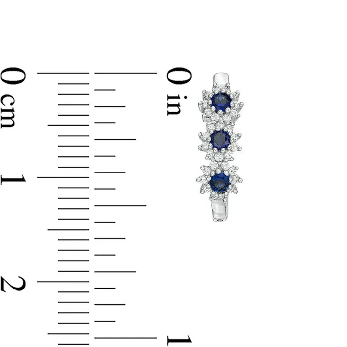 Goldia Earrings LabCreated Blue Sapphire and 02 CT TW Diamond Three Stone Sunburst Hoop Earrings in 10K White Gold Goldia Earrings LabCreated Blue Sapphire and 02 CT TW Diamond Three Stone Sunburst Hoop Earrings in 10K White Gold