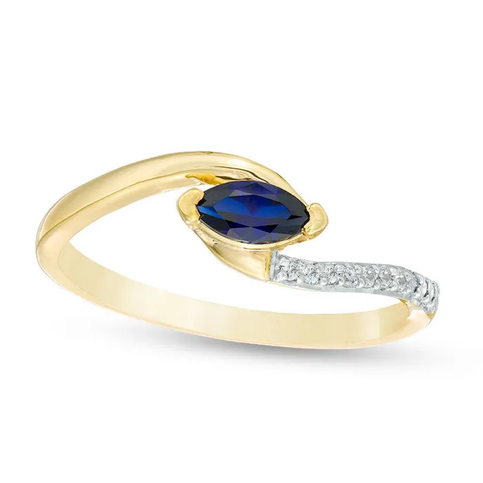 Sideways Marquise LabCreated Blue Sapphire and Diamond Accent Bypass Promise Ring in Solid 10K Yellow Gold Goldia Rings Sideways Marquise LabCreated Blue Sapphire and Diamond Accent Bypass Promise Ring in Solid 10K Yellow Gold Goldia Rings